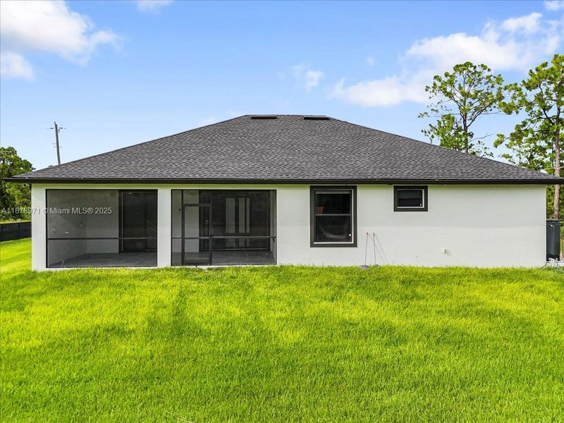 Front exterior of a new home in , Labelle, FL, highlighting curb appeal (Image 1).