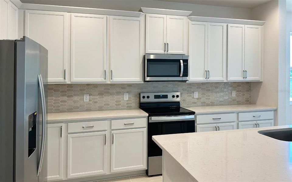 Furnished interior view inside a new home in Trinity Place, St. Cloud (Image 7).