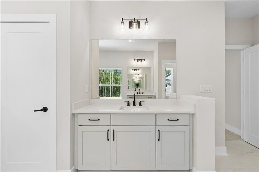 Furnished interior view inside a new home in Meadow Brook Farms, Cumming (Image 10).