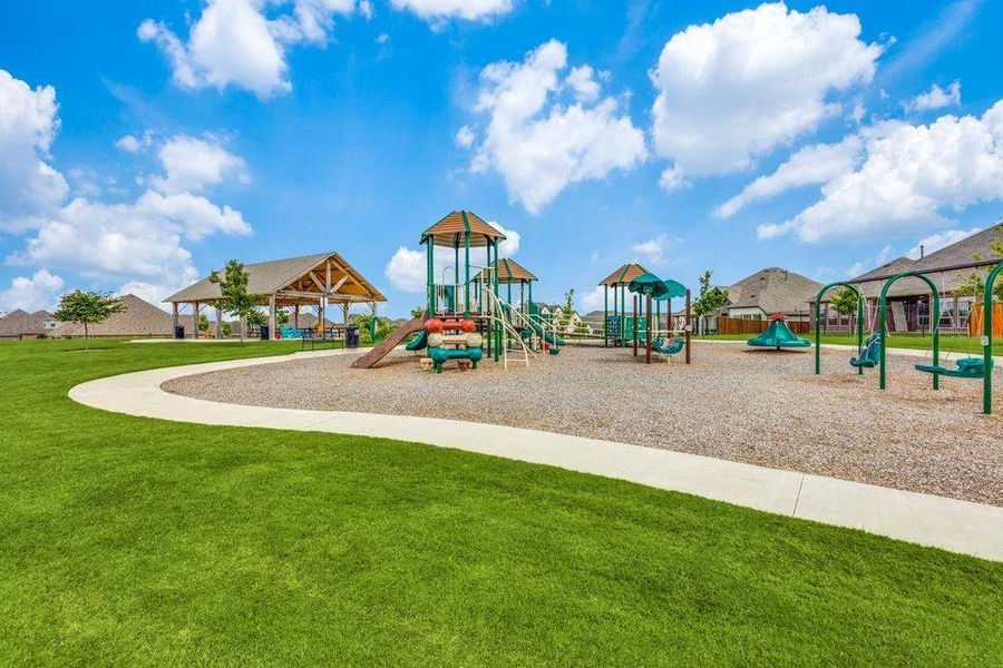 Front exterior of a new home in Breezy Hill, Rockwall, TX, highlighting curb appeal (Image 2). Front exterior of a new home in Breezy Hill, Rockwall, TX, highlighting curb appeal (Image 2).