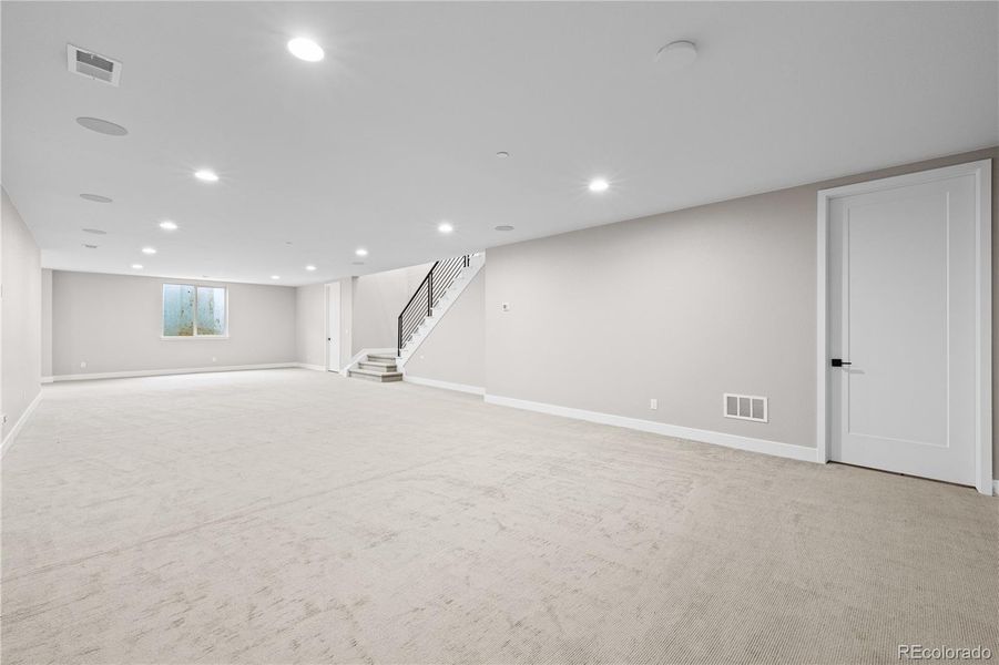 The lower level recreation | media room is made for entertaining.