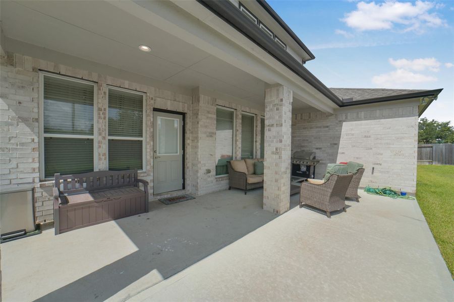 Covered patio ideal for outdoor dining and relaxation.