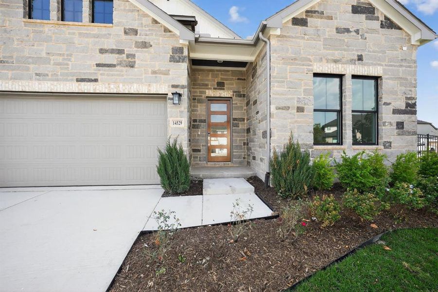 Exterior details and patio area of a home in Walsh Ranch, Fort Worth (Image 18).