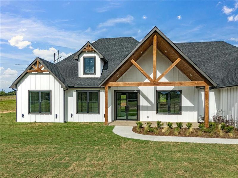 Front exterior of a new home in , Alvord, TX, highlighting curb appeal (Image 24).