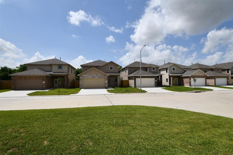 Front exterior of a new home in , Houston, TX, highlighting curb appeal (Image 1). Front exterior of a new home in , Houston, TX, highlighting curb appeal (Image 1).