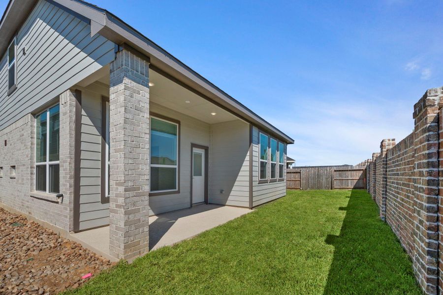 Exterior details and patio area of a home in Emory Glen, Magnolia (Image 3).