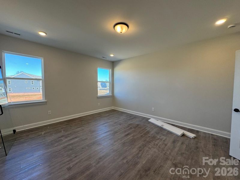 Primary bedroom with EVP flooring