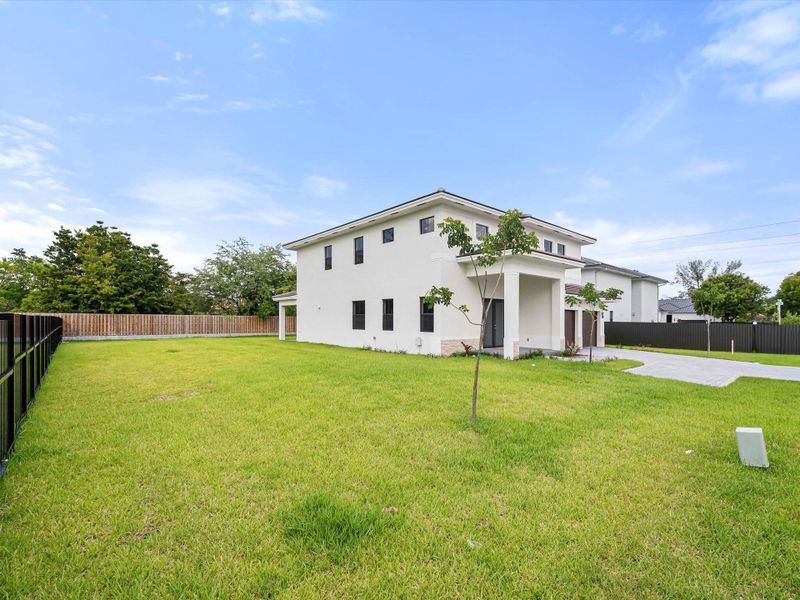 Front exterior of a new home in , Miami, FL, highlighting curb appeal (Image 23).