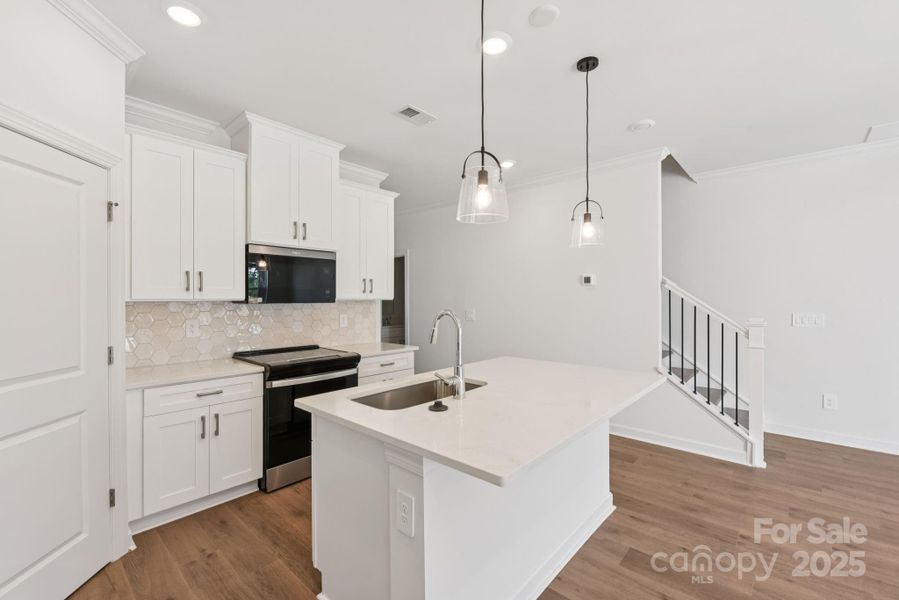 Photo is not of the actual home, but is an inspirational photo of builder’s model home and may depict options, furnishings, and/or decorator features that are not included