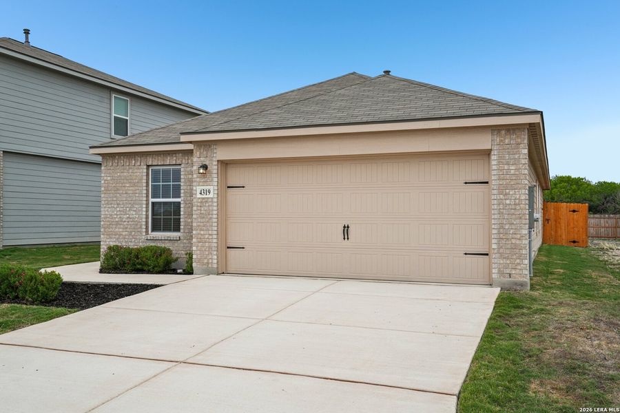 Front exterior of a new home in Preserve at Medina, Von Ormy, TX, highlighting curb appeal (Image 19). Front exterior of a new home in Preserve at Medina, Von Ormy, TX, highlighting curb appeal (Image 19).