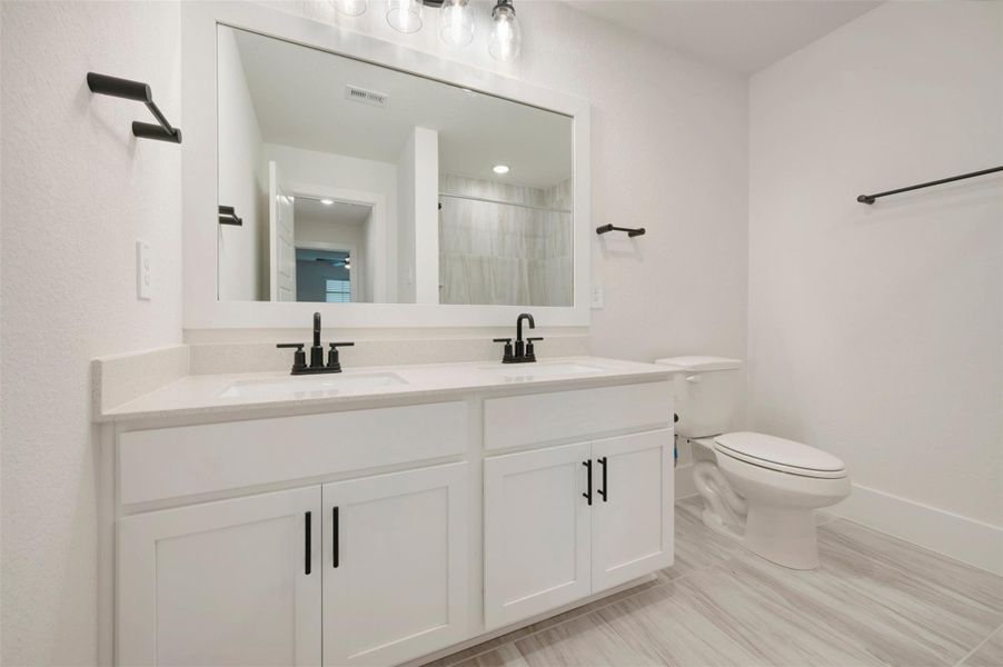 Furnished interior view inside a new home in Lone Star Landing, Montgomery (Image 14).