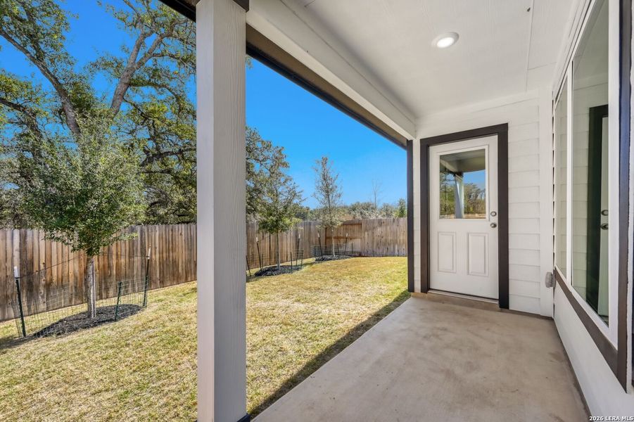 Exterior details and patio area of a home in Timber Creek, San Antonio (Image 22).
