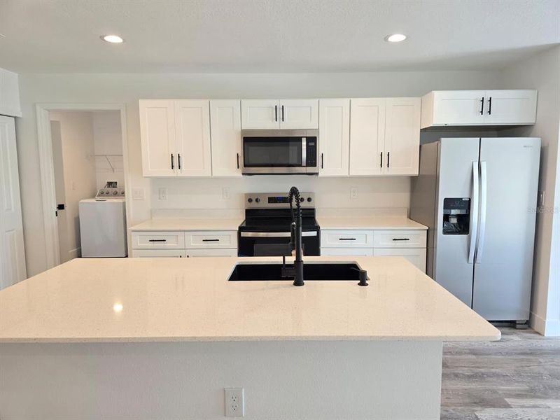 Furnished interior view inside a new home in , Port Charlotte (Image 9).