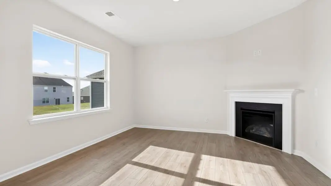 Spacious, unfurnished interior of a new home in Durbin Meadows Traditions, Fountain Inn (Image 18).
