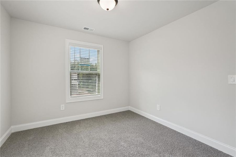 Spacious, unfurnished interior of a new home in Hemingway - Reserve Series, Cumming (Image 37).