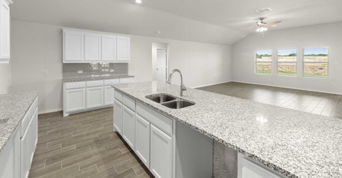 Representative exterior photo of a completed home built from the Walden II by Impression Homes in Mountain Valley, Burleson, TX (Image 18). Representative exterior photo of a completed home built from the Walden II by Impression Homes in Mountain Valley, Burleson, TX (Image 18).