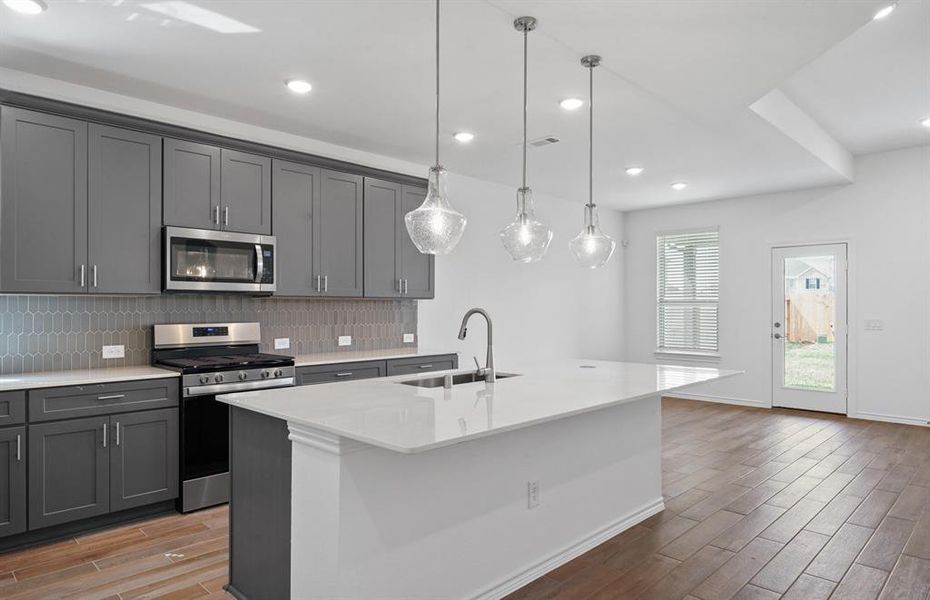 Furnished interior view inside a new home in Sunterra, Katy (Image 7).