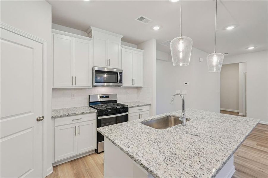 Furnished interior view inside a new home in Harmony Manor, Fairburn (Image 14).