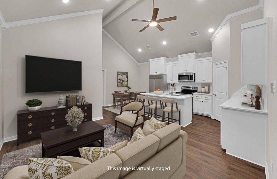 Living area with ornamental molding, beamed ceiling, a ceiling fan, high vaulted ceiling, and dark wood-style flooring