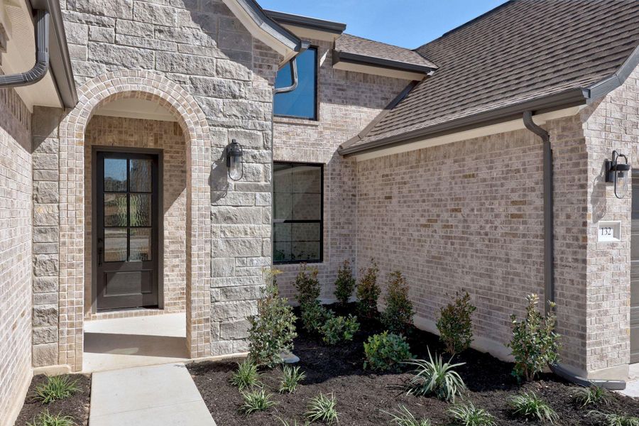 Exterior details and patio area of a home in Nolina, Georgetown (Image 21). Exterior details and patio area of a home in Nolina, Georgetown (Image 21).
