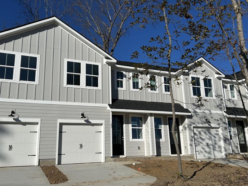 Front exterior of a new home in , Summerville, SC, highlighting curb appeal (Image 1). Front exterior of a new home in , Summerville, SC, highlighting curb appeal (Image 1).
