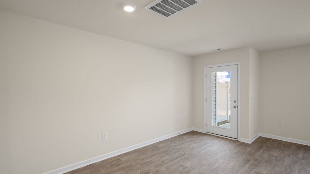 Representative unfurnished interior of a home built from the Pearson by D.R. Horton in The Townes at Ridgewood Farms, Winterville (Image 22).