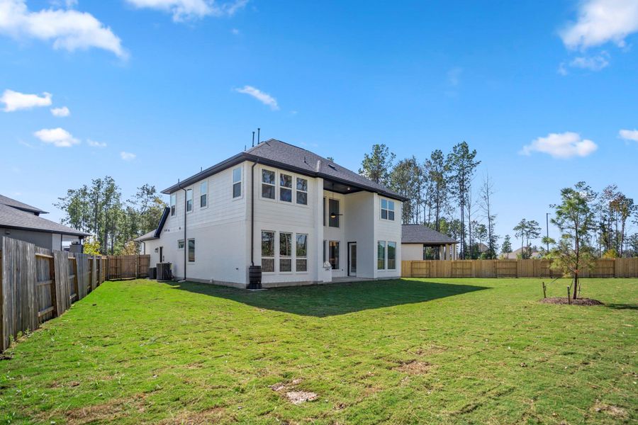 Exterior details and patio area of a home in ARTAVIA 55' Lots, Conroe (Image 3). Exterior details and patio area of a home in ARTAVIA 55' Lots, Conroe (Image 3).