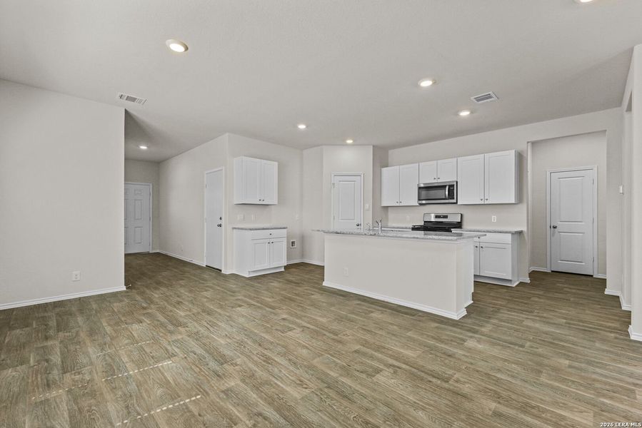 Furnished interior view inside a new home in Hunters Ranch, San Antonio (Image 4).