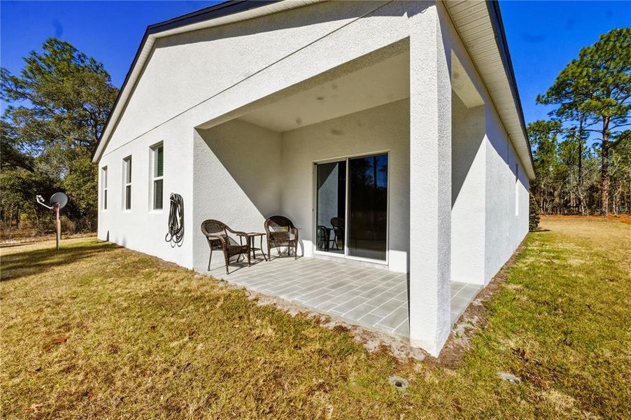 Exterior details and patio area of a home in , Ocala (Image 3).