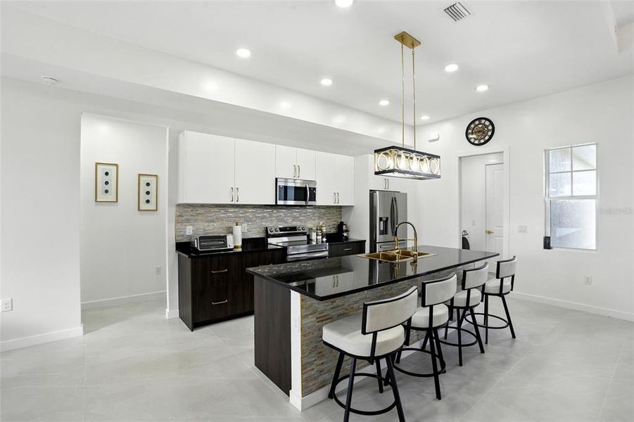 Furnished interior view inside a new home in , Placida (Image 3). Furnished interior view inside a new home in , Placida (Image 3).