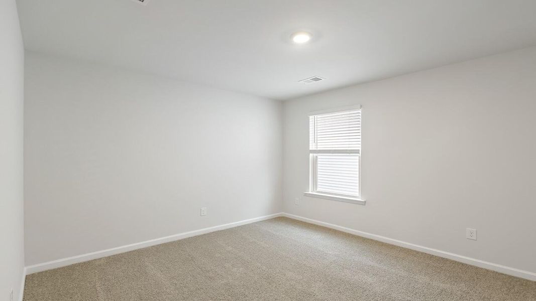 Spacious, unfurnished interior of a new home in The Cove at Mallard Crossing, Summerville (Image 24).