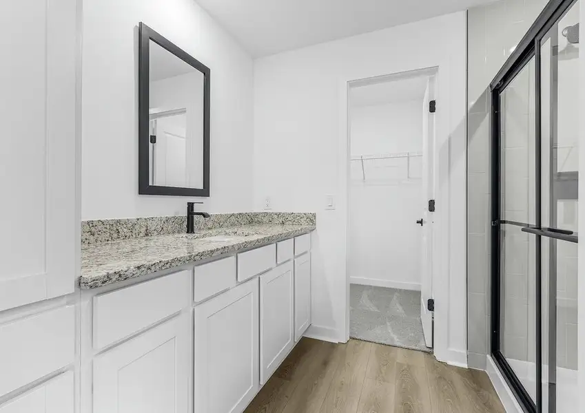 Get ready for your day in the master bathroom