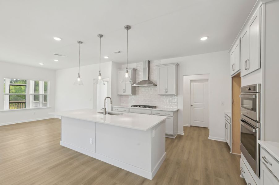 Representative furnished interior of a home built from the Jordan by Ashton Woods in Rowland's Grant, Fuquay Varina (Image 5).