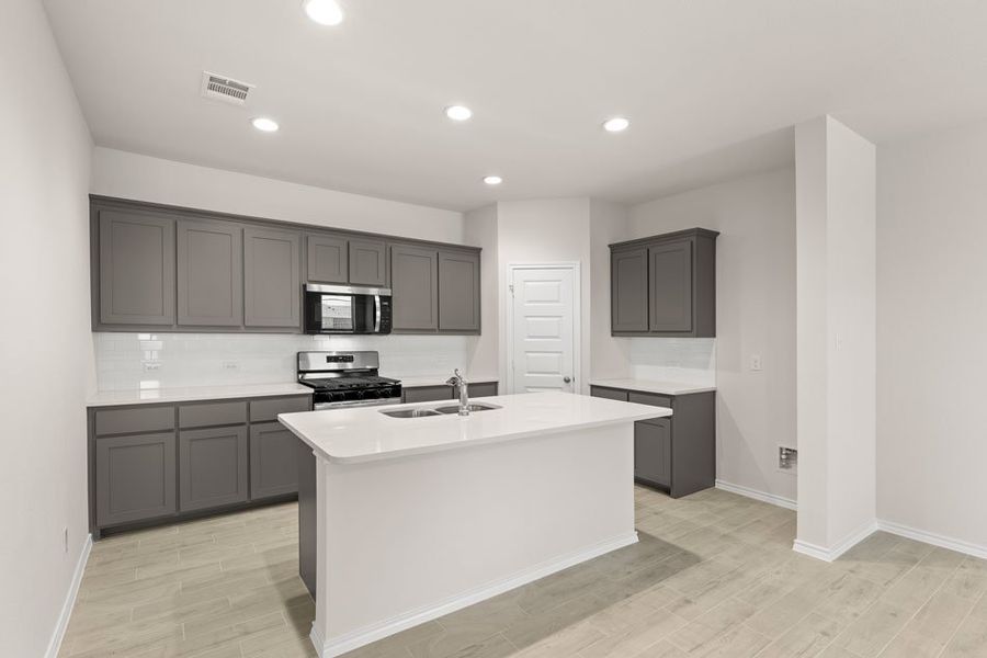 Front exterior of a new home in Northspur, Terrell, TX, highlighting curb appeal (Image 12). Front exterior of a new home in Northspur, Terrell, TX, highlighting curb appeal (Image 12).