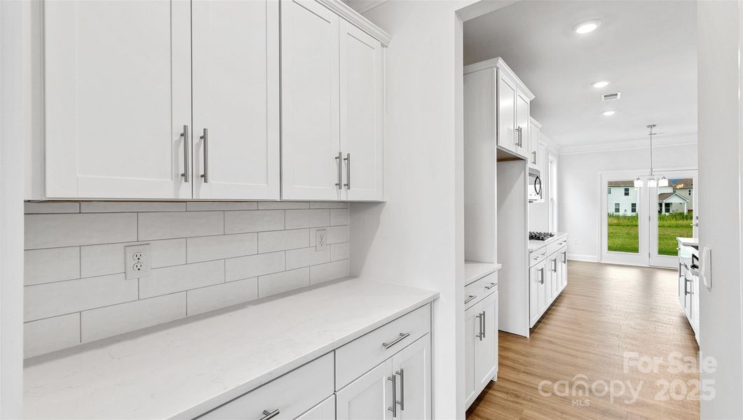Photo is representative but kitchen cabinets are white