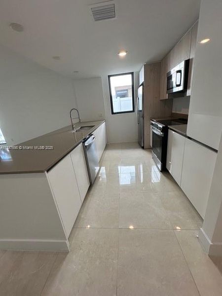 Furnished interior view inside a new home in , Dania Beach (Image 8).