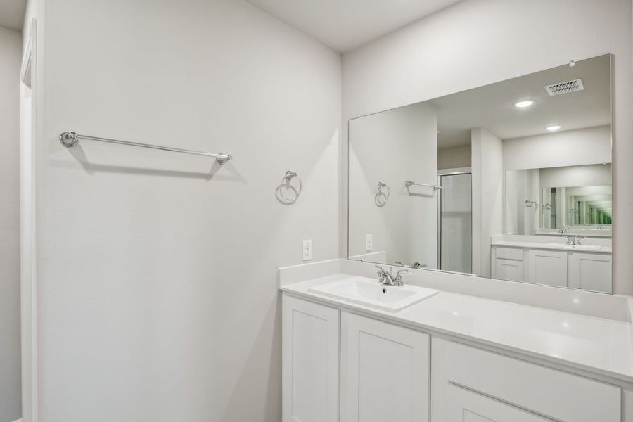 Primary Bathroom in the Sabrina home plan by Trophy Signature Homes – REPRESENTATIVE PHOTO