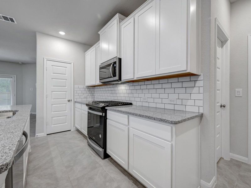 Photo is not of the actual home, but is an inspirational photo of builder’s model home and may depict options, furnishings, and/or decorator features that are not included.