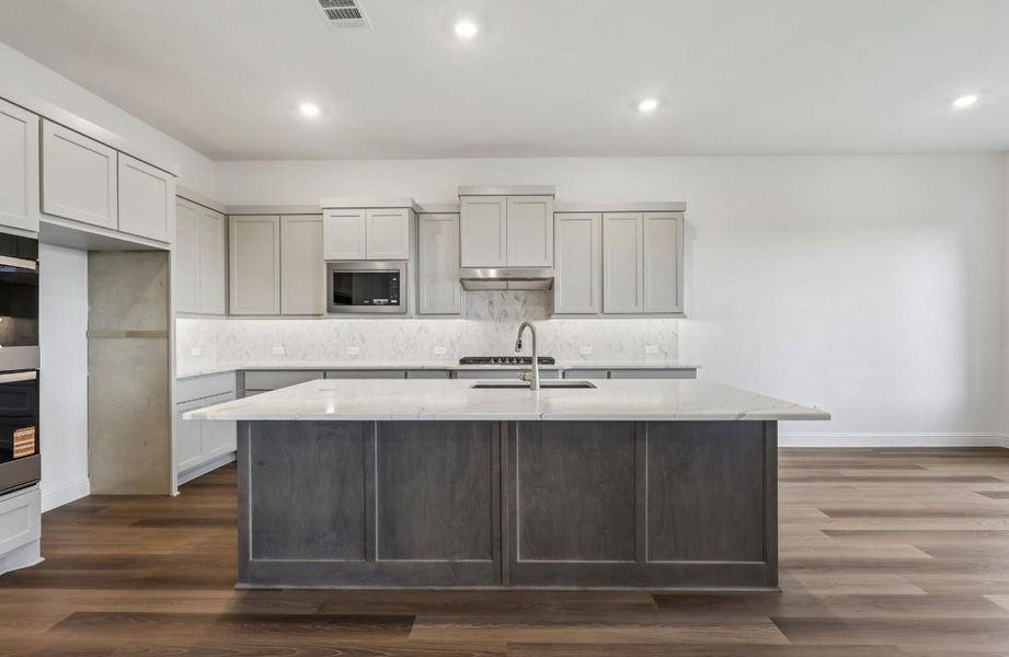 Furnished interior view inside a new home in The Grand Prairie 60', Hockley (Image 6).