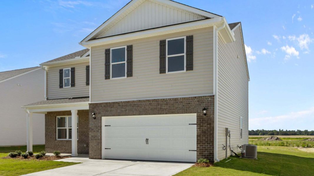 Front exterior of a new home in East Ridge, Ayden, NC, highlighting curb appeal (Image 18).