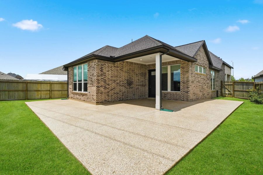 Extended concrete patio creates the perfect outdoor entertaining space. Extended concrete patio creates the perfect outdoor entertaining space.