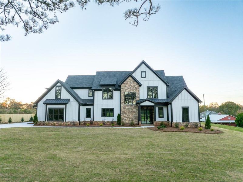 Front exterior of a new home in , Cumming, GA, highlighting curb appeal (Image 27).