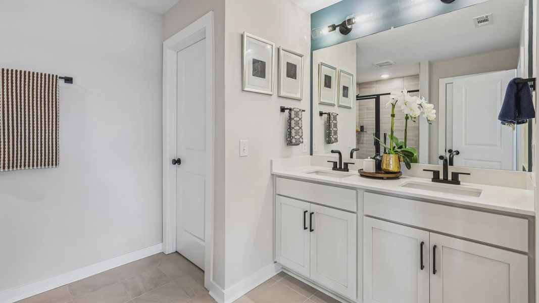 Primary bathroom with dual vanity