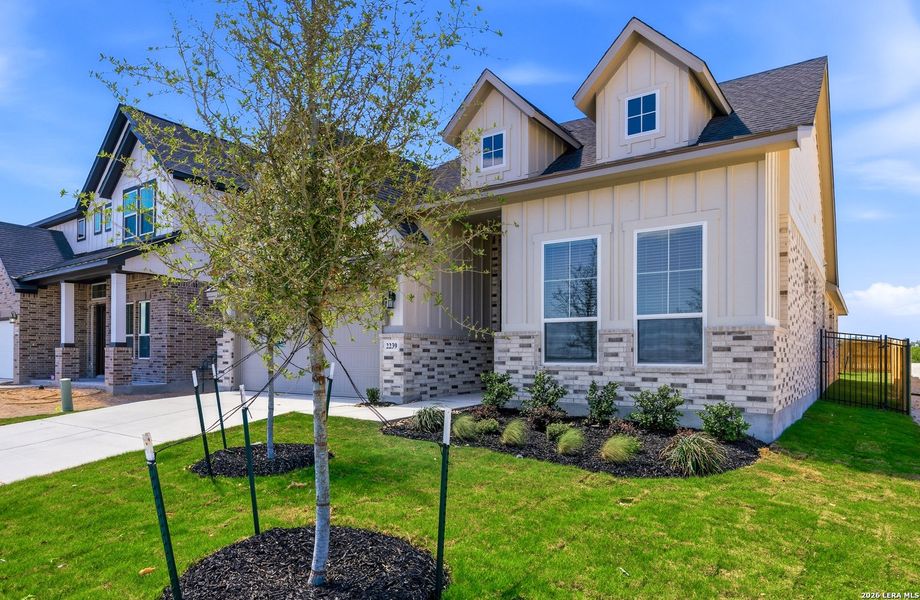 Front exterior of a new home in Prominence Urban, San Antonio, TX, highlighting curb appeal (Image 1). Front exterior of a new home in Prominence Urban, San Antonio, TX, highlighting curb appeal (Image 1).