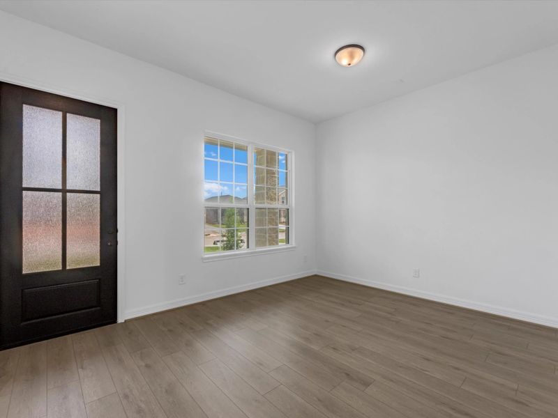 Home entry and flex space. Sample product photo. Actual exterior and interior selections may vary by homesite. Photo may be virtually staged.
