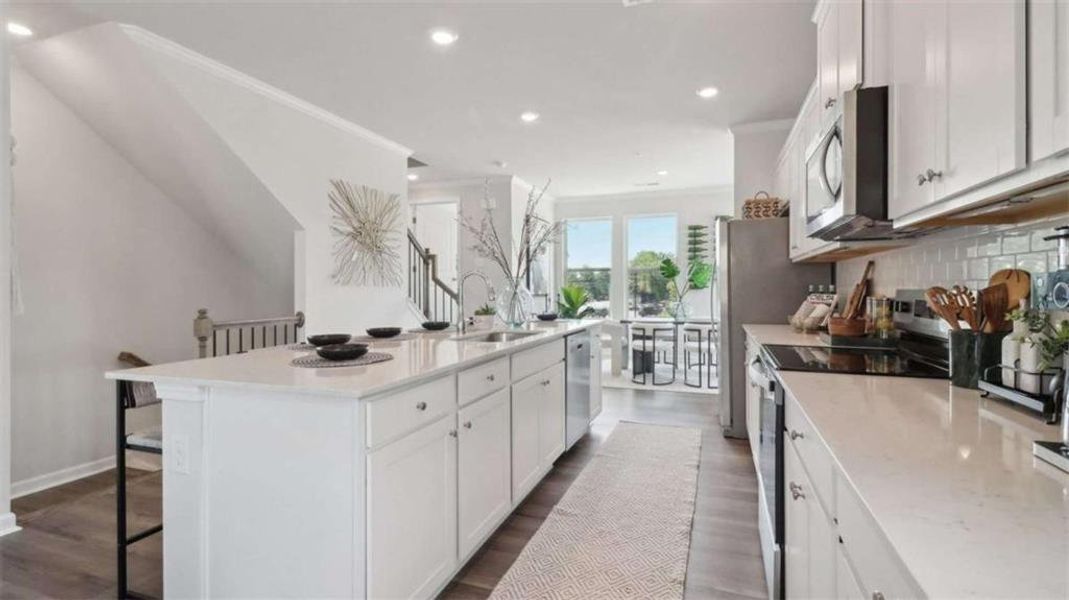 Furnished interior view inside a new home in Townes at Asbury, Hapeville (Image 15).