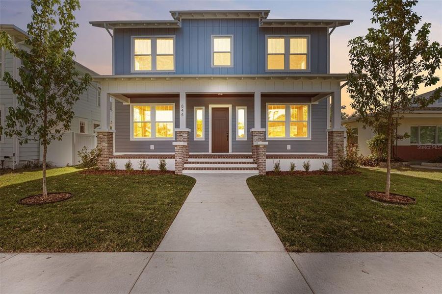 Front exterior of a new home in , St. Petersburg, FL, highlighting curb appeal (Image 29).