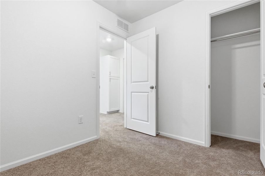 Spacious, unfurnished interior of a new home in Reunion, Commerce City (Image 13).