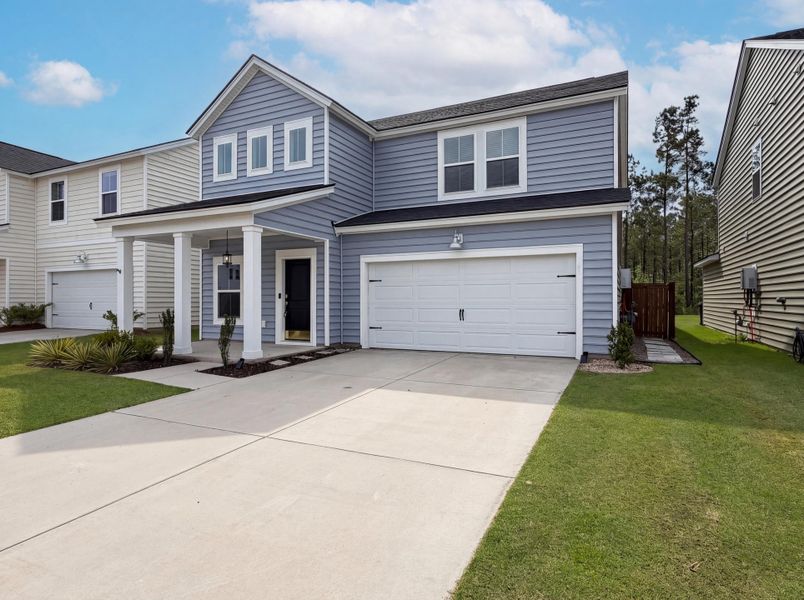 Front exterior of a new home in , Summerville, SC, highlighting curb appeal (Image 15).