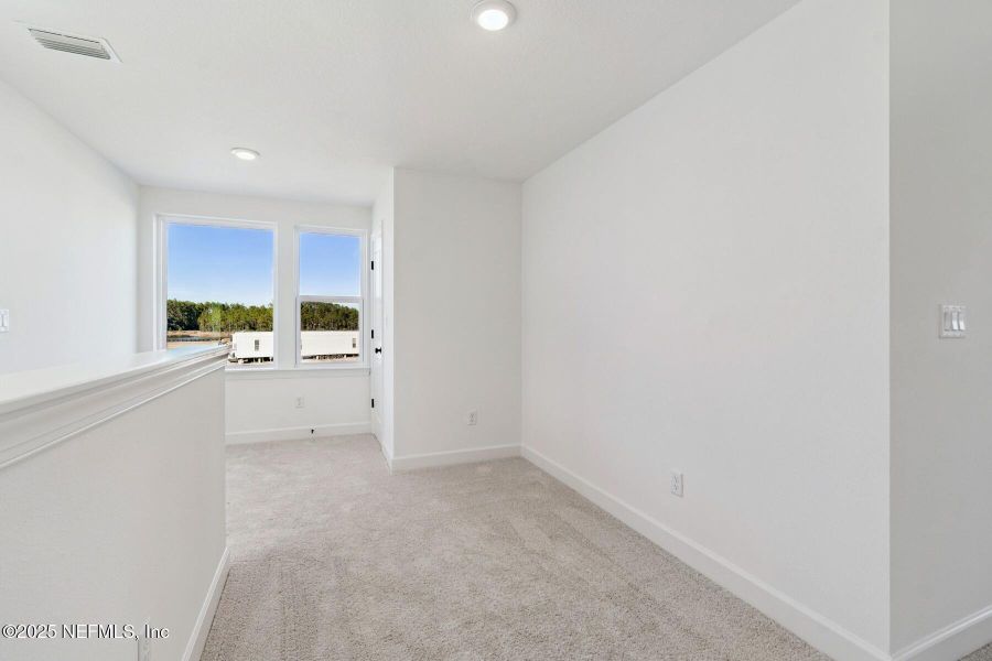 Spacious, unfurnished interior of a new home in Evergreen Island at Silverleaf - Classic, St. Augustine (Image 15).